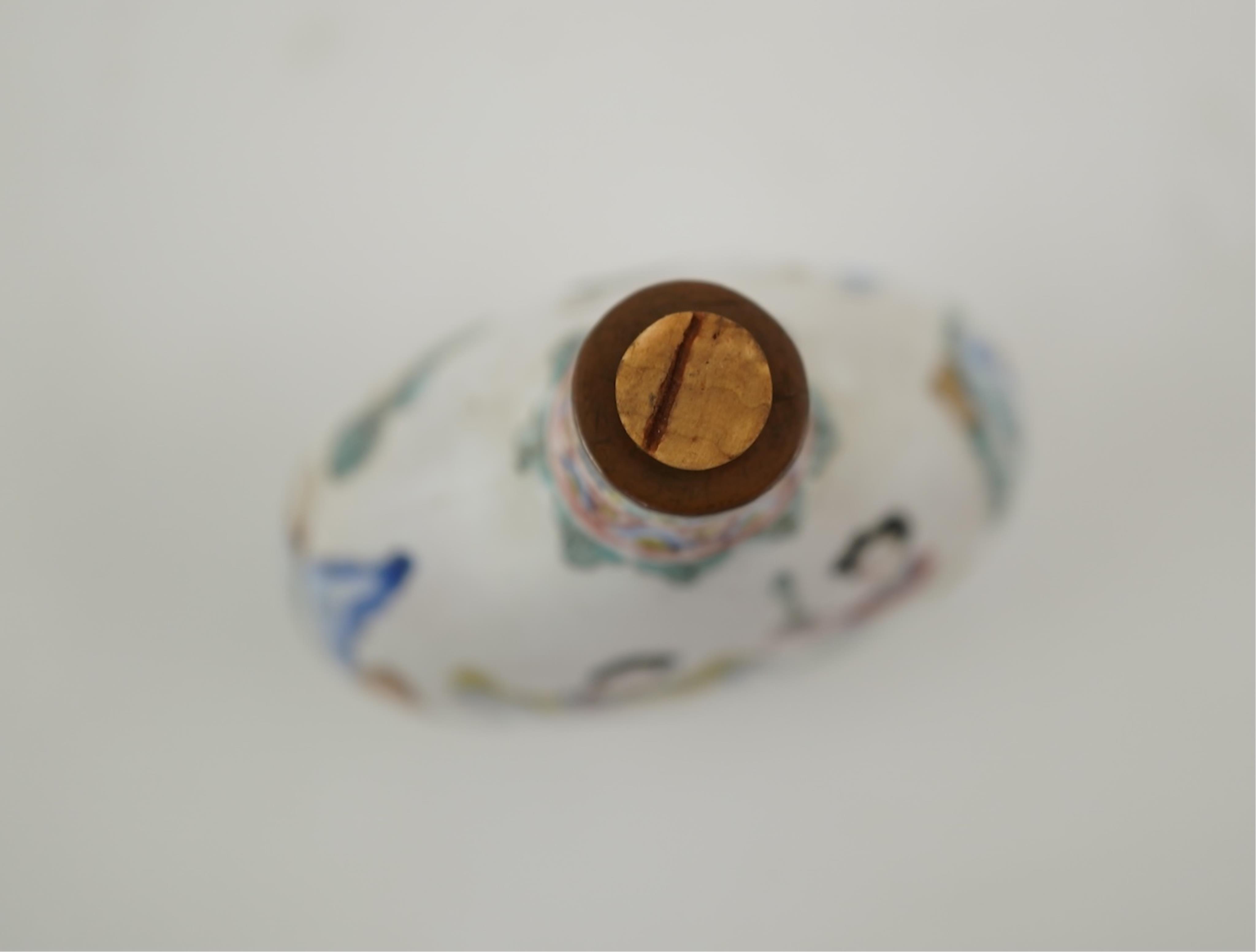 A Chinese Guangzhou enamel snuff bottle, Qianlong mark, 19th century